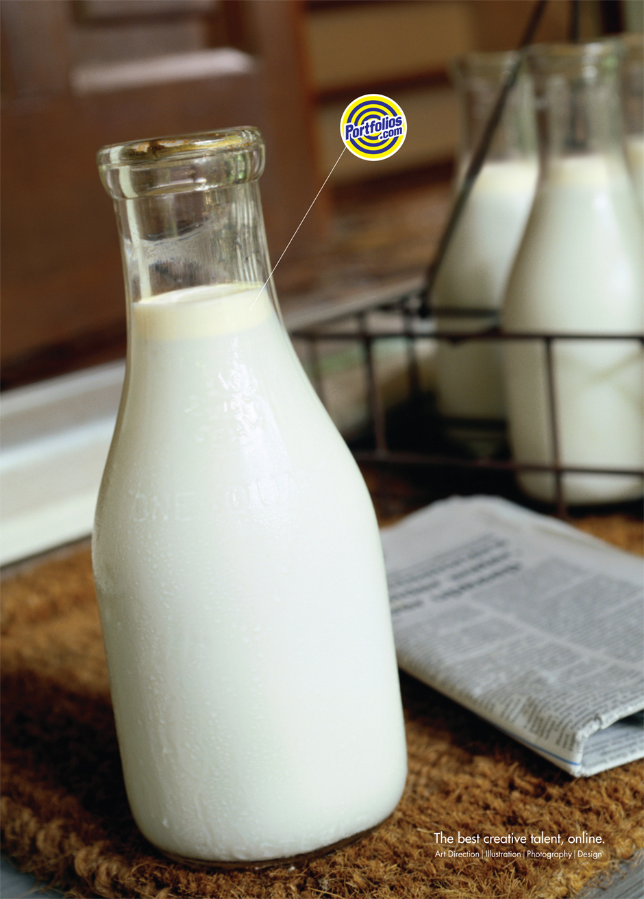 A milk bottle showing cream rising to the top. A line points to the portfolios.com logo.